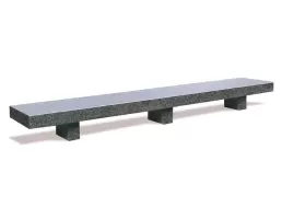 Long concrete bench with three legs